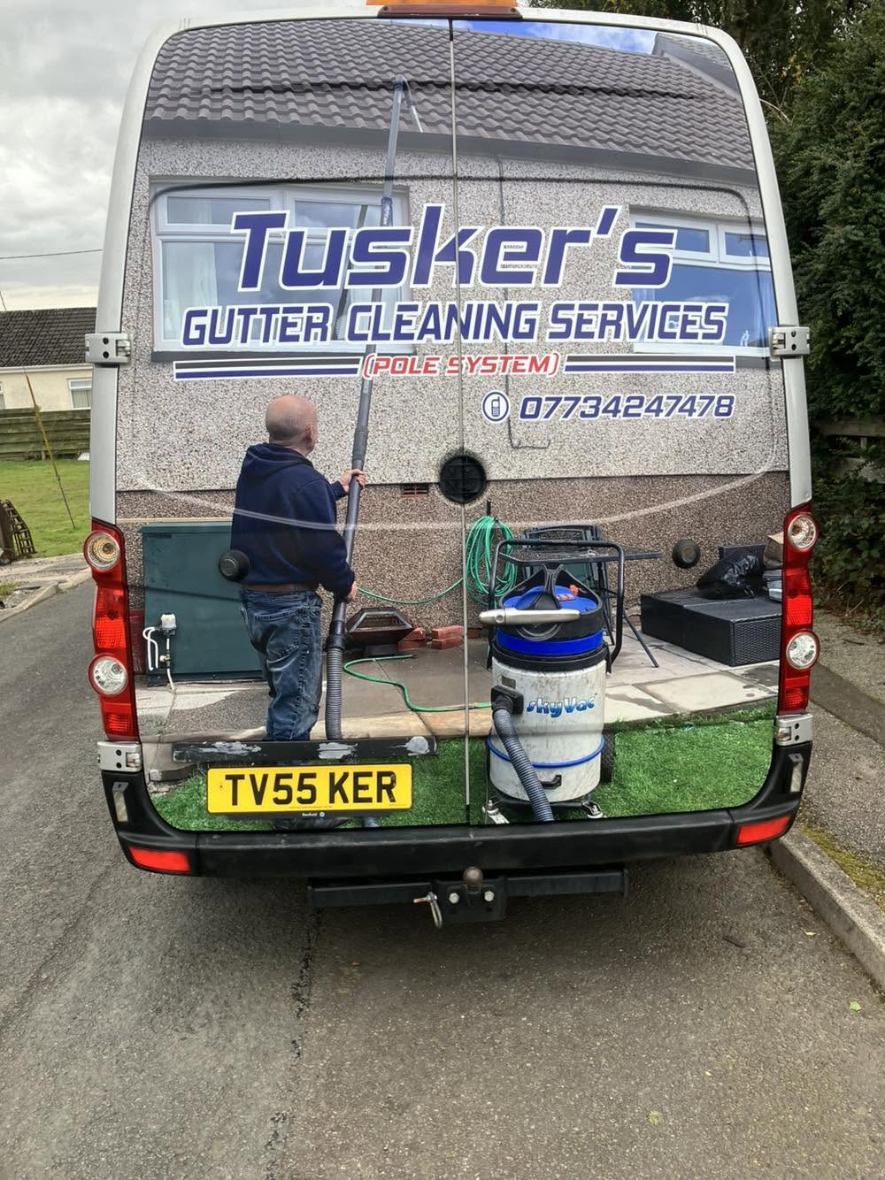 Tuskers gutter cleaning van with pole-system equipment